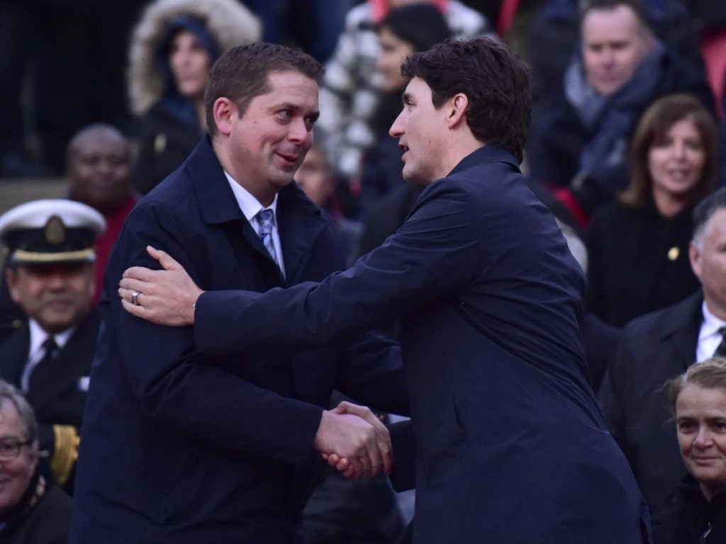 Federal Conservative Leader Andrew Scheer, left, greets Prime Minister Justin Trudeau at a vigil remembering the victims of Toronto's deadly van attack, at Mel Lastman Square in Toronto on April 29, 2018. Scheer's Conservatives are working hard to fill the vacuum created by the sovereigntist party's plunge in the polls, Chantal Hébert writes.