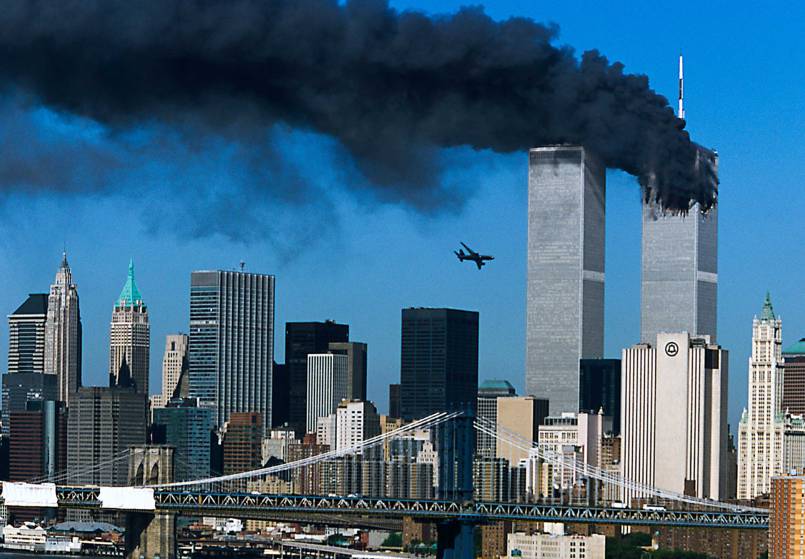 Kent Kobersteen, former Director of Photography of National Geographic "The pictures are by Robert Clark, and were shot from the window of his studio in Brooklyn. Others shot the second plane hitting the tower, but I think there are elements in Clark's photographs that make them special. To me the wider shots not only give context to the tragedy, but also portray the normalcy of the day in every respect except at the Towers. I generally prefer tighter shots, but in this case I think the overall context of Manhattan makes a stronger image. And, the fact that Clark shot the pictures from his studio indicates how the events of 9/11 literally hit home. I find these images very compellingÑin fact, whenever I see them they force me to study them in great detail."