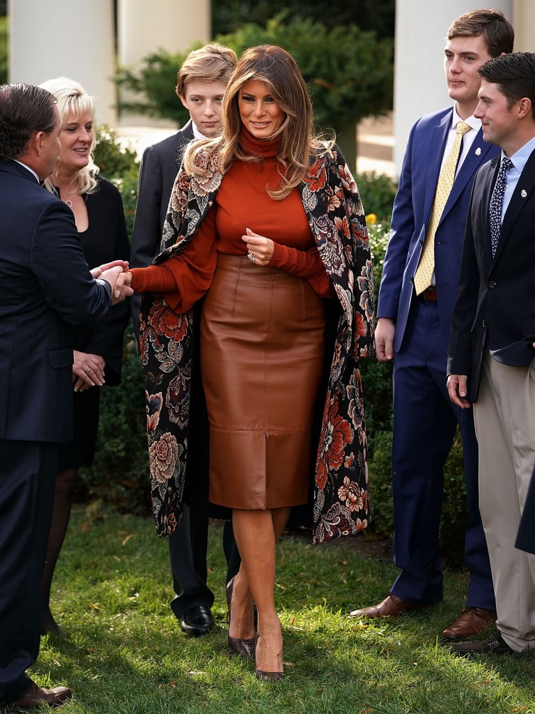 WASHINGTON, DC - NOVEMBER 21:  U.S. first lady Melania Trump waves goodbye as she and her son, Barron Trump leave following the pardoning ceremony of the National Thanksgiving Turkey in the Rose Garden at the White House November 21, 2017 in Washington, DC. Following the presidential pardon, the 40-pound White Holland breed which was raised by National Turkey Federation Chairman Carl Wittenburg in Minnesota, will then reside at his new home, 'Gobbler's Rest,' at Virginia Tech.  (Photo by Chip Somodevilla/Getty Images)