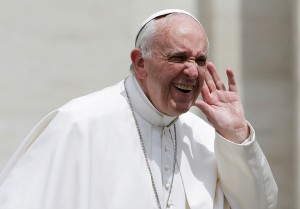 Pope Francis gestures at the end of the weekly audience in Saint Peter's Square at the Vatican May 18, 2016. REUTERS/Max Rossi     TPX IMAGES OF THE DAY      - RTSETG8