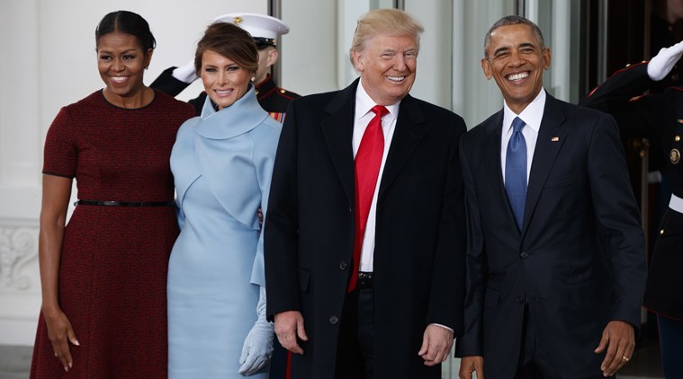 President Barack Obama, first lady Michelle Obama, President-elect Donald Trump and Melania Trump stand at the White House in Washington, Friday, Jan. 20, 2017. (AP Photo/Evan Vucci)